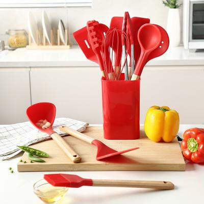 China Reusable Viable Silicon Adaptive Cookware No Harm Pot Cookware Sets Silicone Kitchenware Set With Storage Rack for sale