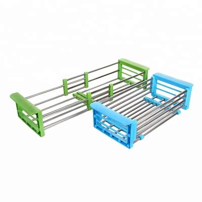 China Viable Kitchen Sink Storage Telescopic Plastic Dish Rack for sale