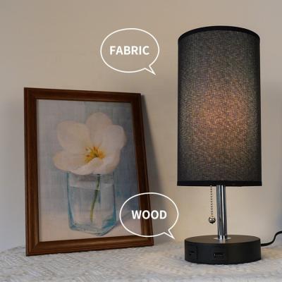 China Cheap Round Table Lamp Table Lights With Double Left USB Decor Hotel Bedroom Lamp Modern Home Night Lights Wood Base Black Bed Side Table Lamp for sale