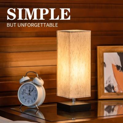 China Samll and small cute modern table lamp with fabric shade hotel bedroom bedside lighting minimalist table lamp for sale