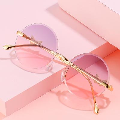 China 2021 KADIMA Eyewear 328 Fashion Sun Glasses Fashion Sunglasses Metal Butterfly Frame Leg Rimless Sun Glasses for sale