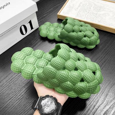 China Fashion trend women's summer new bubble balls unisex slippers bubble slips household massage slippers men's bubble shoes lychee slippers for sale