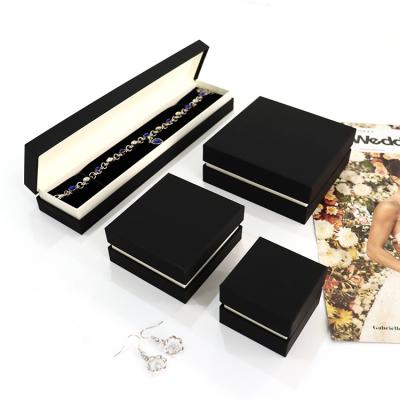 China Black And White Jewelry Packaging Personailized Logo Flap Wall Style Cardboard Paper Gift Packaging Jewelry Box for sale