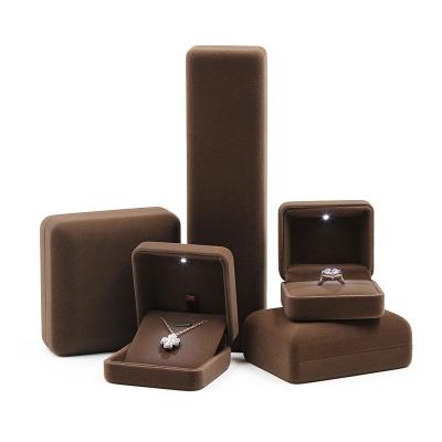 China 100% factory handmade luxury velvet custom jewelry boxes packaging set ring box necklace display bracelet packing led jewelry box for sale