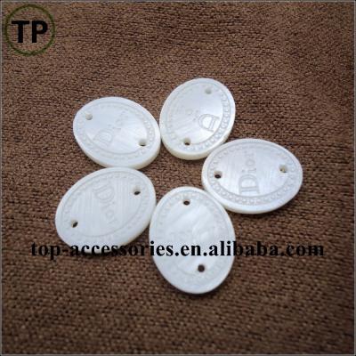 China White Natural Material Dry Cleaning Pearl Two Holes Garment Shell Label / Badge With Logo for sale