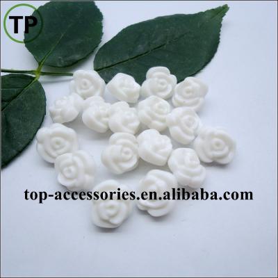 China Dry Cleaning Small ABS Plastic Flower Button For Shirt Decorative Button for sale