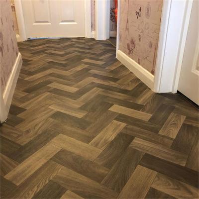 China Fashion or European and American Style Laminate Flooring Herringbone Blue Laminate Parquet. for sale