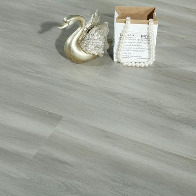 China Contemporary Wholesale Prices Embossed To Texture Flooring Mat Virgin Material PVC Plastic Vinyl Tiles Gray Spc Flooring for sale