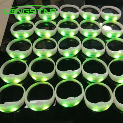 China Fast Flashing -- Slow Flashing --Regular On --Off Site Remote Control Luminous Wristband New Event DMX Function Silicone Wristband Environmental Friendly Wristband for sale