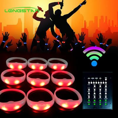 China It Flashes By A Controller Remote Control Bracelets DMX LED Wristband Glow Wristband Concert Silicone Led Wristband for sale