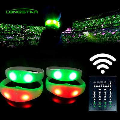 China Change color each time you press the button concerts party meters distance LED Controller wristband DMX event wristbands silicone LED glowing flashing wristband for sale