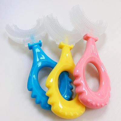 China Food Grade Silicone Soft Home Types Brush Manual Training Mouth Cleaning Baby Kids U Shape Toothbrush Kids for sale