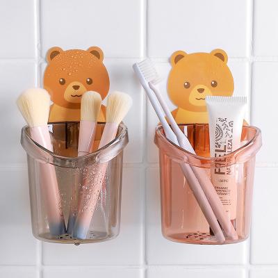 China Bathroom Accessories Teddy Bear Wall Mounted Kids Toothbrush Holder Punchless Cup Organizer Bathroom Supplies Storage Rack Home Hotel for sale