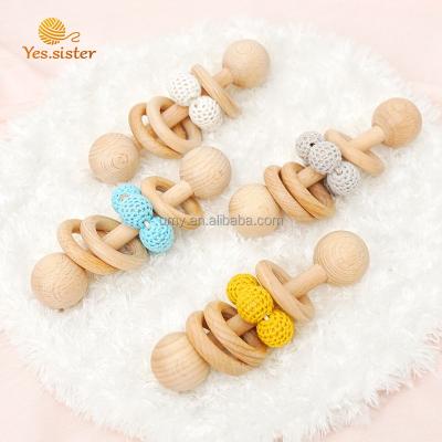 China Montessori Soft Beech Wood Beads Ring Soft Teething Toy Wooden Bell Baby Rattle Toys for sale