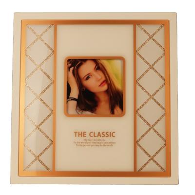 China 12x12 Elegant White Acrylic Photo Album Skin Factory Eco-friendly Beautiful Design And Stick Large Gold Color Wedding Photo Albums for sale