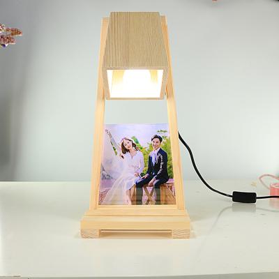 China Envrioment Friendly Low Cost Craft Art Desk Lamp Home Decoration Wooden Table Lamp With Picture for sale