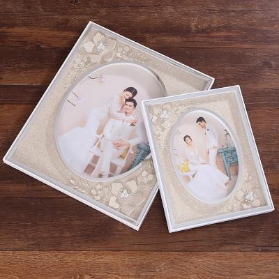 China Eco-friendly professional design crystal table picture frame couple wedding glass photo frame for sale