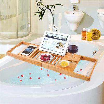 China Natural Bamboo Place Tub Caddy With Sides Shower Expanding Tray Rack With Waterproof Cloth for sale