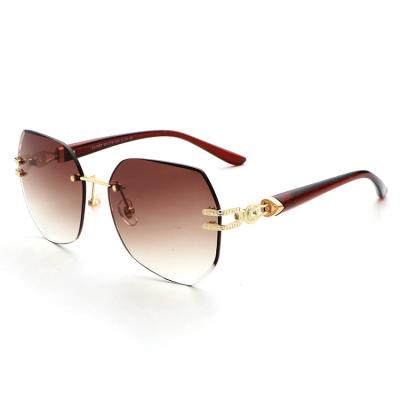 China 10 Years Experience Big Brown Shade Women's Sunglasses Vintage Retro Sunglasses Oversized Luxury Rimless Eyewear Brand for sale