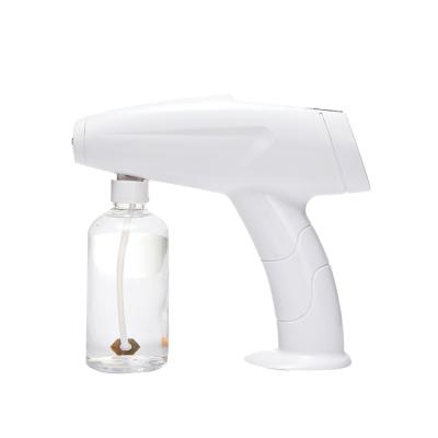 China Garden Gun Mini Handheld Blue Light Contact Spray Gun Atomizer Nano Electric Disinfection Gun for sale