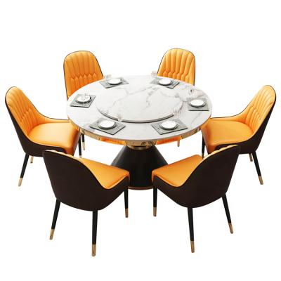 China (Other) 6 Seater Stainless Steel & Marble Adjustable Chair Luxury Leather Round Dining Tables With Rotating Center for sale