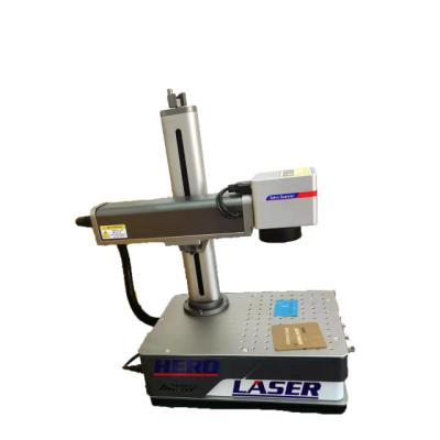 China Garment Shop Mini Portable Fiber Laser Machine Desktop Marker for sale