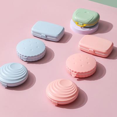 China Portable Pink Pill Box Pill Case Organizer Travel 7 Day Cute Cookie Shape Tiny Plastic Pill Organizer for sale