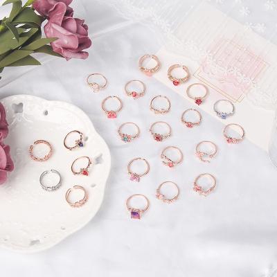 China New FASHIONABLE Korean Flower Cubic Zirconia Lovers Ring Drop Crystal Party Rings Adjustable For Girls for sale