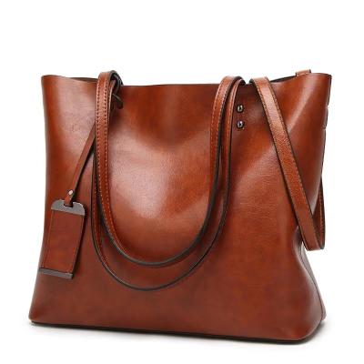 China Retro Ladies Fashion Extra Large Capacity Leather Handbag Simple Fashion Soft Shoulder Lady Bags for sale