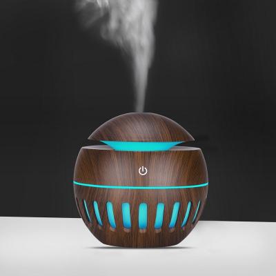 China Hotel Ultrasonic Small Portable Aroma Essential Oil Diffuser Cool Spray Mist 7 colour Mini Led Air Humidifier for home for sale