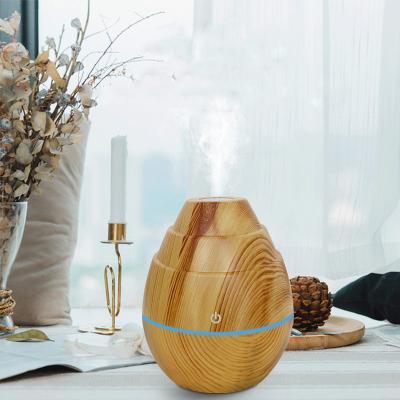 China Hotel Mini home portable led personal ultrasonic air usb humidifier diffuser with light for sale