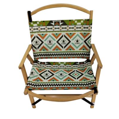 China Modern Beach Folding Wooden Camping Chair With Wooden Armrest à venda