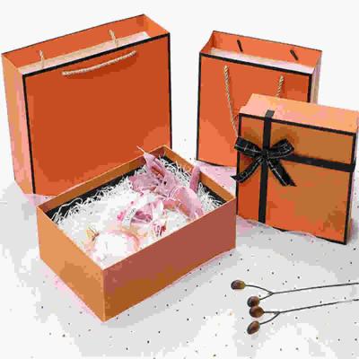 China Handmade Custom Rigid Cardboard Lid-Up Wedding Gift Box With Ribbon for sale