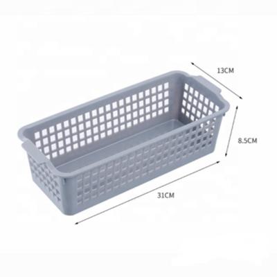 China Hollow Storage Box Plastic Rectangular Desktop Snack Basket Bathroom Orgniser Cosmetic Storage Basket for sale