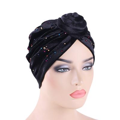 China New Wholesale Colored Flower Turban Checked Muslim Headscarf Velvet Turbans For Women for sale