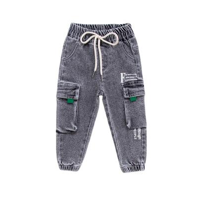 China Color Fade Proof New Arrivals 2022 spring baby pants multi pockets pants kids jeans drawstring jeans for girl for sale