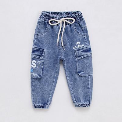 China Color Fade Proof New Trending fashion 2022 autumn children's blue jeans kids cargo pants baby kids drawstring jeans girls jeans latest for sale