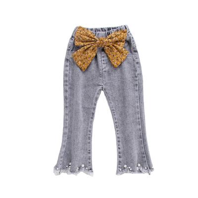 China Color Fade Proof Trending Toddler Jeans Fork Open Leg Beaded Tassel 2022 New Style Autumn Winter Denim Cotton Kids Flare Pants For Girls for sale