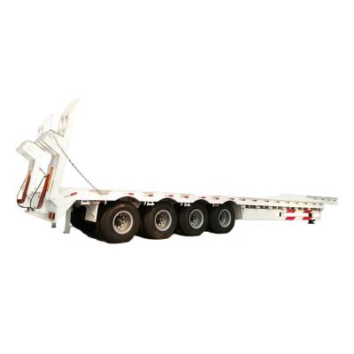 China Used truck trailer 30 ton low bed semi trailer low bed semi trailer 4 axle 40t low flatbed trailer dolly with wooden floor for sale