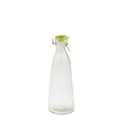 China Viable Wholesale Empty Glass Beverage Juice 700ml Glass Bottles With Top Cap Lid Water Bottle Glass for sale