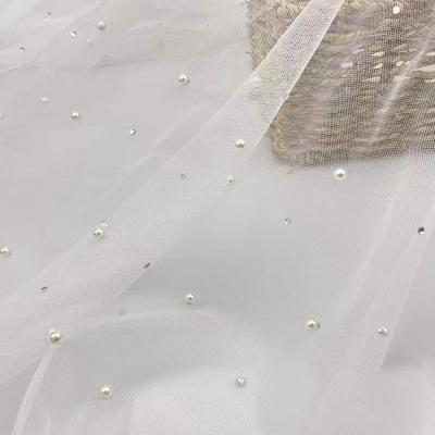 China Breathable NO MOQ 100%nylon Rhinestone Design Tulle Beading Fabric Beaded Lace Tulle Mesh Fabric for sale