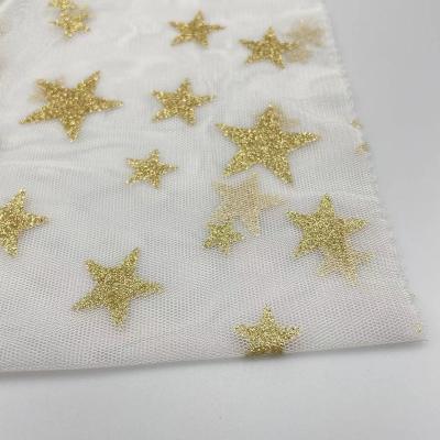 China Accept Tear-resistant Custom Design Wholesale Star Print Fabric Mesh Glitter Tulle Mesh Fabric For Dress for sale