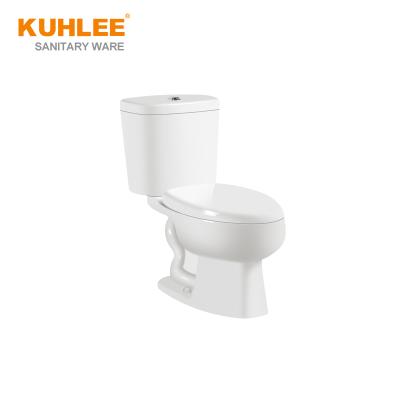 China Double-Flow South America Commode Toilet Seat Siphonic S Trap Two-Piece Toilet With Soft Close Seat for sale