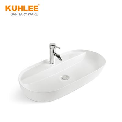 China White Ceramic Basin Modern Oval Bathroom Countertop Sink Single Hole Art Basin for sale