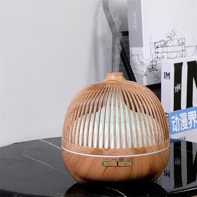 China Household 550ML Birdcage Ultrasonic Wood Electric Aromatherapy Oil Aroma Diffuser Essential Grain Humidifier Wood Diffuser for sale