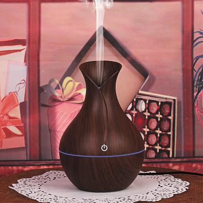 China 130ML Car Vase Essential Oil Air Humidifier Mini Wood Grain LED Lights Diffuser USB Ultrasonic Mist Diffuser For Office Home for sale