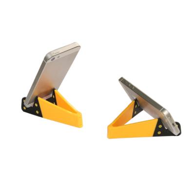 China Portable Colors Portable Mini Folded Table Desk Stand Holder Mount For Mobile Phone Adjustable V Shape Holder for sale