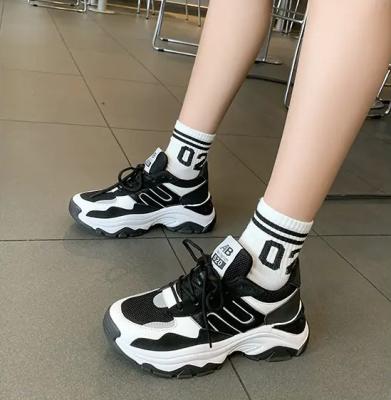 China 2021 fashion trend hot sale women sneakers shoes white spring sport unique thick casual shoes lace up comfortable women walking style shoes for sale