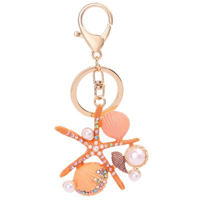 China New Fashion Ocean Series Diamond-encrusted Hannah Kim's Key Chain Scallop Pearl Charm Pearl Shell Fashion Bag Accessories for sale