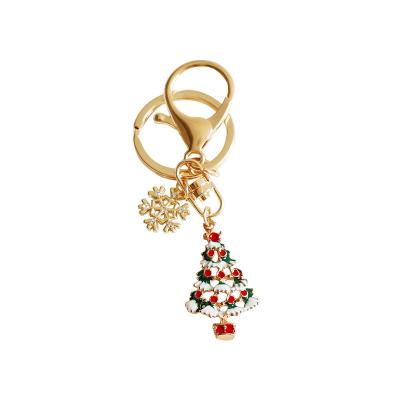 China Fashion Low Price Santa Claus Elk Merry Christmas Ornaments Christmas Key Chain Decorations For Home Xmas Gifts Snowman Keychain for sale